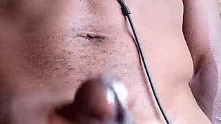 Stroking that big black cock until cum hits the floor, homemade style.
