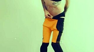 in lingerie, the hot transsexual rubs her clitty while fantasizing about cock and masturbation.