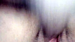 Hot brunette enjoys wetting herself