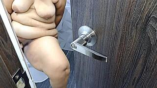 I surprise this sexy milf touching her mature pussy in the bathroom.