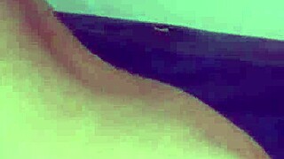 Asian woman fingers wet pussy solo in homemade masturbation