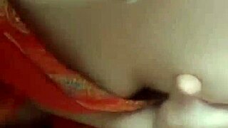 Asian woman fingers wet pussy solo in homemade masturbation