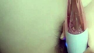 Asian woman fingers wet pussy solo in homemade masturbation