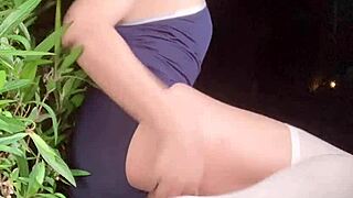 Crossdressing beauty in white stockings and bikini exposes herself outdoors in public tribute to yurilily