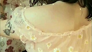 Kawaii woman shows tits in bedroom