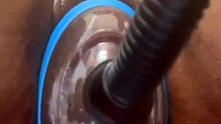 Feeling the pumping machine and dildo on swollen pussy