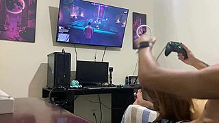 Sucking Him While He Plays Video Game