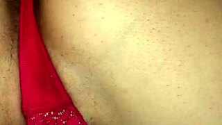 Why is the wife rubbing and fingering her pussy?