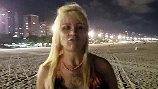 Blonde beach babe flashes tits and pussy in public voyeur scene