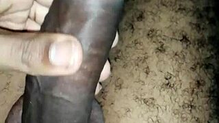 A black guy strokes his monster cock