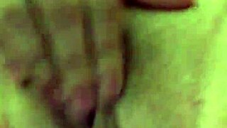She uses a vibrator on her dry pussy lips during masturbation