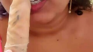 Black camgirl gives a guided hand job