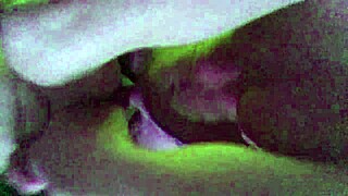 Neon lights ignite wild sex with a seductive milf.