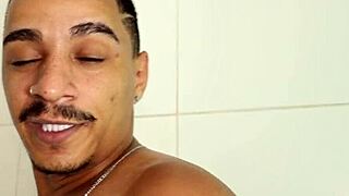 big black guy bathes and gets sucked by white guy