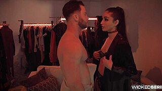 Emily Willis explores the red room in this scene.