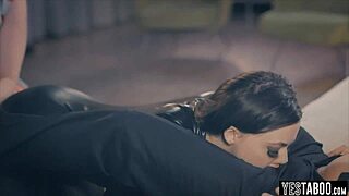 Black latex and white lingerie chicks in group scene.