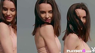 I'm loving this petite blonde teen's outdoor striptease dance