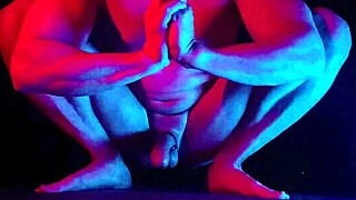 Defiant neon erection sparks during intense yoga session