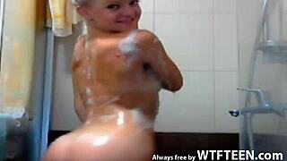 Lovely cutie smiles while washing her hot body, or is it teasing on wtfteen?