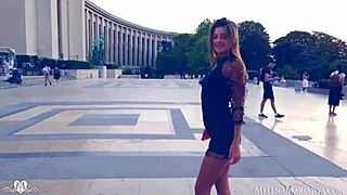 French brunette in public outdoor reality in Paris.