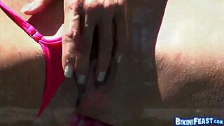 wet bikini pussy stretching with brunette big tits close up
