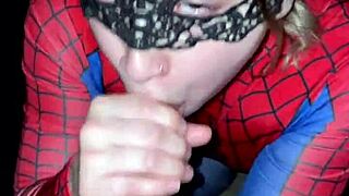 Blonde in spider costume takes big black cock while amateurs watch