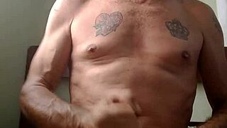 Gay man giving a blowjob to another man.