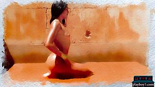 Katherinne Sofia teases with a slow strip for Playboy