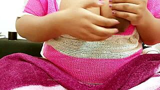 Beautiful Indian woman exposing her breasts.