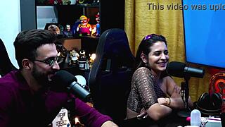 She pulls out her husband's cock during the podcast and sucks it deep