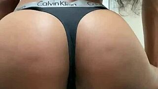 Nelly shows her sexy shaved asshole in thong