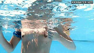 Ivi Rein's petite Russian body shines underwater at the pool