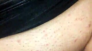 Bound girl masturbates with black dildo under mask 😈