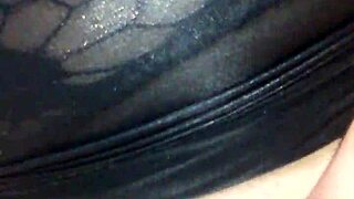 Bound girl masturbates with black dildo under mask 😈