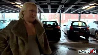 British blonde flashes perky assets in public with daring outdoor pissing