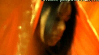 Brunette cougar undresses erotically, dancing and teasing with striptease