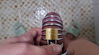 I pee with a chastity belt on my cock in this solo session