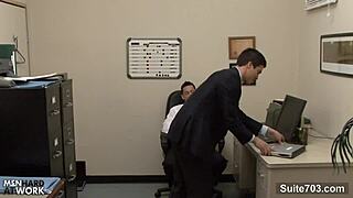 Horny gay workers fuck in the office.
