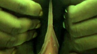 Ebony babe teasing with striptease in public bathroom