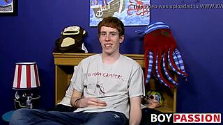 Guy with red hair gets interviewed before a solo session