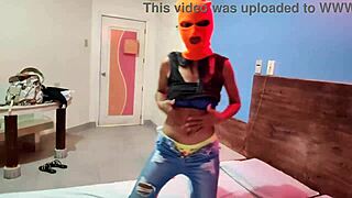 My brunette stepsister intensely shakes her body in a hotel bed for Halloween celebration