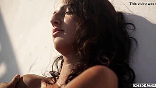 Petra Red in wet and oiled summer erotica shoot with xczech.com. Stunning teen shines in photography session.