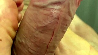 Gay fetish action with foot licking and big cock worship