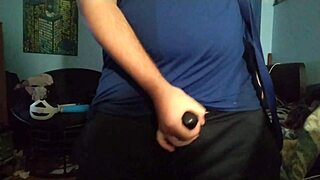 I use my chastity cage for masturbation in this gay video