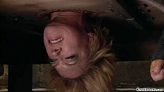 gimp dominates busty milf in femdom play