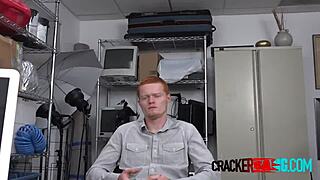 Gay redhead sucks director's big cock at work.