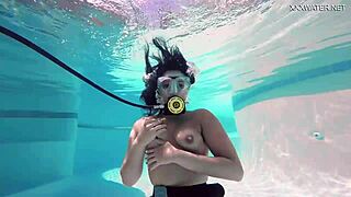 brita piskova dives underwater in the swimming pool. the teen 18+ masturbates solo.