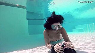 brita piskova dives underwater in the swimming pool. the teen 18+ masturbates solo.