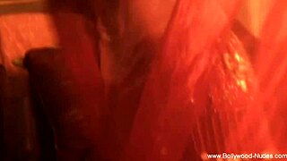 Erotic belly dancing performed by a nude brunette beauty in a teasing manner.